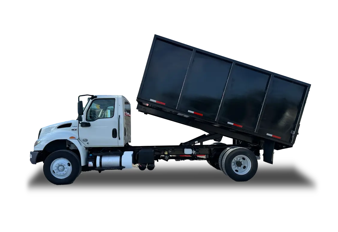 Dump truck with raised bed, side view